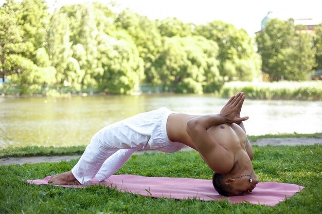 Feeling scattered, anxious, or disconnected from your body? Tantric yoga has a specific toolkit for this. Here's what grounding actually means in this tradition — and how to do it.